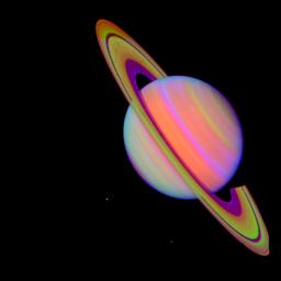 PIA01143: Saturn With Rhea and Dione (false color)