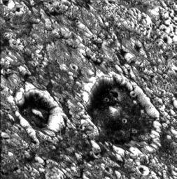 PIA01607: Dark-floored Impact Craters on Ganymede