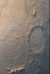 PIA01676: "Happy Face" Crater Greets MGS at the Start of the Mapping