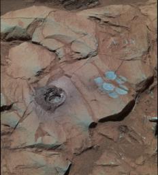 PIA06836: Deep Hole in 'Clovis' (False Color)