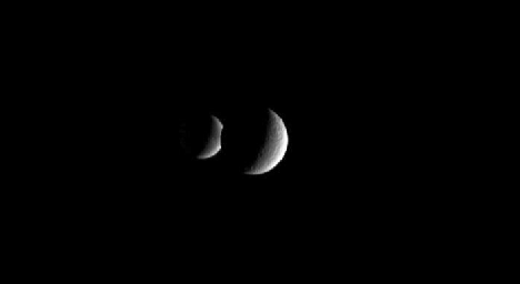 PIA07770: Rhea Eclipses Dione (Animation)