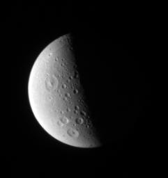 PIA08314: Holey Dione!