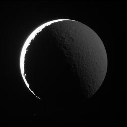PIA08986: Rhea in Saturnshine