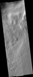 PIA09514: Eroding Material over Flows in Echus Chasma