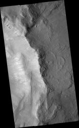 PIA09536: Gullies in Inner Slope of Crater and Exposed Bedrock