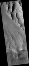 PIA09583: Oudemans Crater Central Uplift: A Sample of Well-Preserved Layering Excavated from Kilometers Below