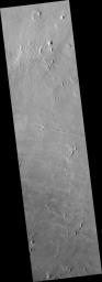 PIA09658: Layered Rocks in a Crater in Arabia Terra
