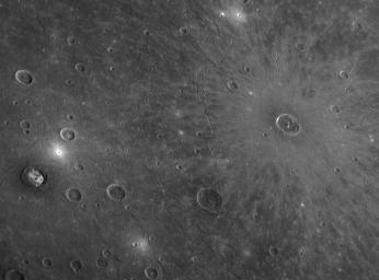 PIA10935: Young Cunningham Crater in Old Caloris Basin