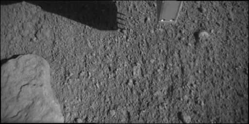 PIA10941: Phoenix Conductivity Probe Inserted in Martian Soil