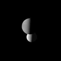 PIA12666: Tethys and Darker Dione