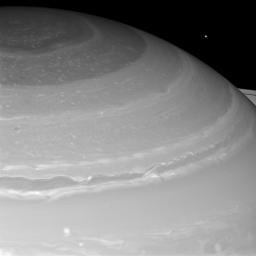 PIA14652: Mimas Peeks Over Saturn