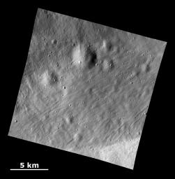PIA15298: Smooth Ejecta with Grooved Surface Showing Buried Craters