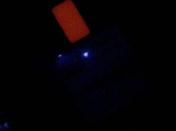 PIA16714: First Night Image of MAHLI Calibration Target Under Ultraviolet Lights