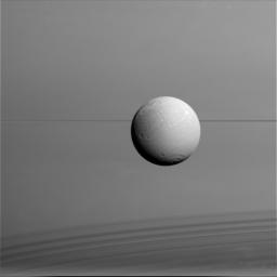 PIA17200: Dione with Rings and Shadows
