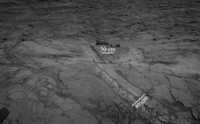 PIA21649: Halos in Martian Sandstone
