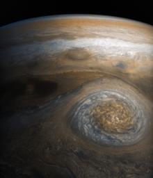 PIA21776: Jupiter Storm of the High North