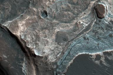 PIA22331: Layers along a Pit in Coprates Catena