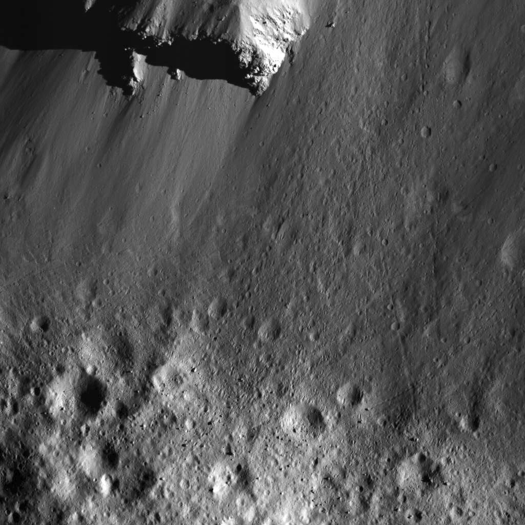 PIA22674: Boulders Along Urvara Crater's Wall