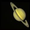 PIA00030: Saturn With Rhea and Dione (True Color)