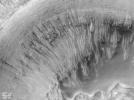 PIA01039: Evidence for Recent Liquid Water on Mars: Channeled Aprons in a Small Crater within Newton Crater