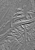 PIA01642: Cracks and Ridges Distorted by Europan Fault Motion