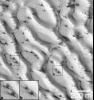 PIA02303: Defrosting Polar Dunes--Dark Spots and Wind Streaks