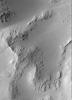 PIA02306: A Typical Martian Scene: Boulders and Slopes in a Crater in Aeolis