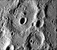 PIA02409: Fresh Crater in Center of Older Crater Basin