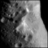 PIA02484: Oblique View of Eros' Crater