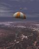 PIA03184: Sample Return Capsule Parachuting Down To Earth (Artist's Concept)
