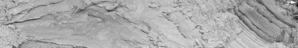 PIA03211: Spectacular Layers Exposed in Becquerel Crater