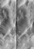 PIA03226: Changes Over a Martian Year -- New Dark Slope Streaks in Lycus Sucli