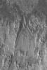 PIA06323: Layered Rocks in Crater