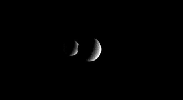 PIA07770: Rhea Eclipses Dione (Animation)