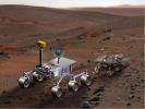 PIA08488: Size Comparison, Mars Science Laboratory and Mars Exploration Rover (Artist's Concept)
