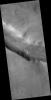 PIA09684: Evros Vallis and Nearby Craters