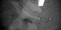 PIA10742: Potential Ice Table Under Lander Imaged
