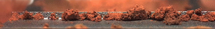 PIA10918: Pan and Zoom of 'Rosy Red' Soil in Scoop