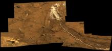 PIA11758: Rover's Wheel Churns Up Bright Martian Soil