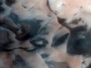 PIA12112: Polygons, Crater Layers, and Defrosting Dunes