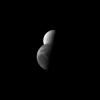 PIA12624: Dione Sliding By Tethys