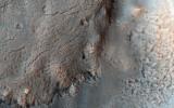 PIA12968: Smooth and Fractured Deposits in Eridania Valleys