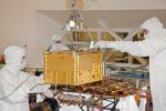PIA13791: Lifting SAM Instrument for Installation into Mars Rover