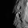 PIA14777: Young and Old Crater at the Night and Day Boundary on Vesta