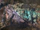 PIA14890: Colorful Central Peak in an Unnamed Crater