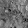 PIA15083: Dark Material Associated with and between Craters