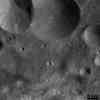 PIA15121: Vesta's Cratered Landscape: Double Crater and Craters with Bright Ejecta