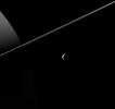 PIA18348: Crescent Tethys and Rings
