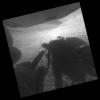 PIA20328: Opportunity's Shadow and Tracks on Martian Slope