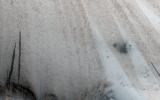 PIA21459: A New Crater on a Dusty Slope
